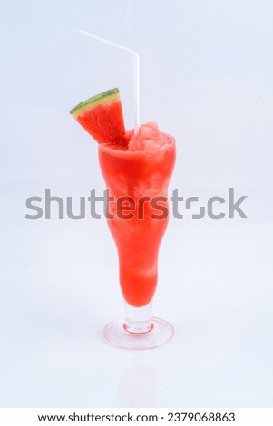 Water melon smoothie. Beverage for summer with brick wall background.
