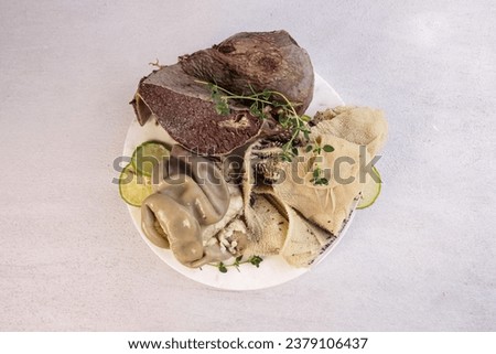 Jeroan Sapi Rebus or Cooked Entrails Beef Organs. Royalty-Free Stock Photo #2379106437