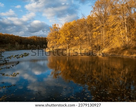 photo of the landscape of the autumn river bank