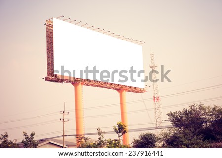 Blank billboard ready for new advertisement. Retro filter.