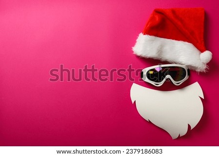 Santa hat with beard and ski goggles