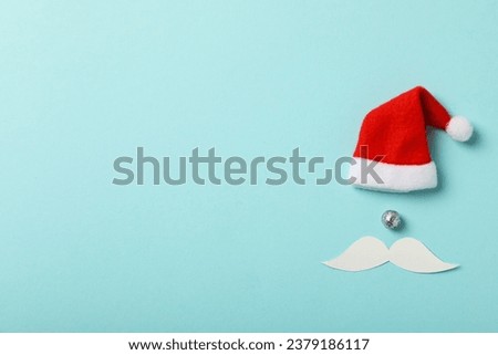 Red cap of Santa Claus with a white mustache