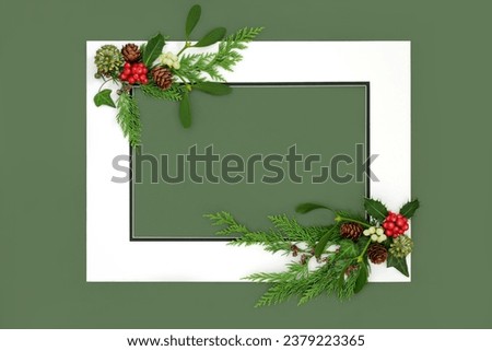 Festive Christmas winter flora with holly mistletoe ivy and cedar on green background with white frame. Holiday border design for greeting card, logo, invitation, label, gift tag.