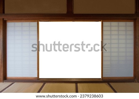 View from the door of an ancient Japanese house and tatami mat. There is a white blackground in the middle Royalty-Free Stock Photo #2379238603