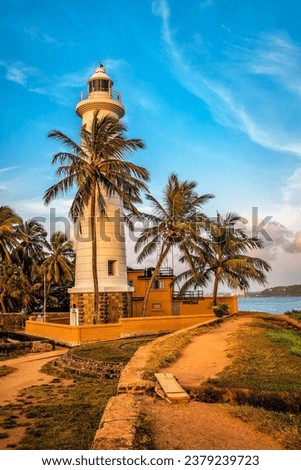View of the Galle lighthouse in Sri Lanka on Sunset or sunrise. Travel and vacation theme Royalty-Free Stock Photo #2379239723