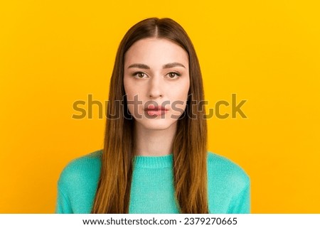 Portrait of serious lady wear season autumn clothes look in camera isolated on vibrant color background. Royalty-Free Stock Photo #2379270665