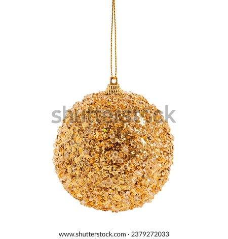 Sparkling glittering christmas bauble or new year tree ball decoration of golden colour with shiny sequins hanging on string or rope isolated on white background used as gift for winter holidays Royalty-Free Stock Photo #2379272033