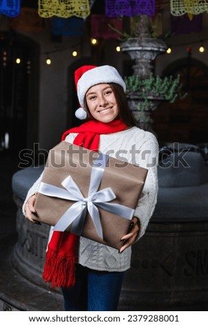 Latin young woman portrait at traditional posada for Christmas celebration in Mexico Latin America