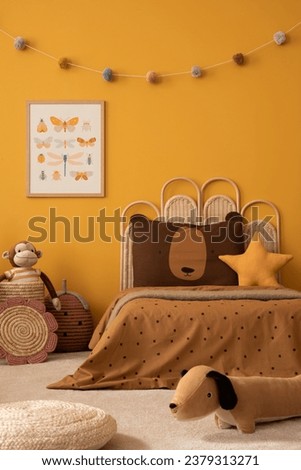 Warm child room interior with mock up poster frame, braided basket, guitar, braided bed, plush lama, monkey, brown bedding, colorful garland and personal accessories. Home decor. Template.
