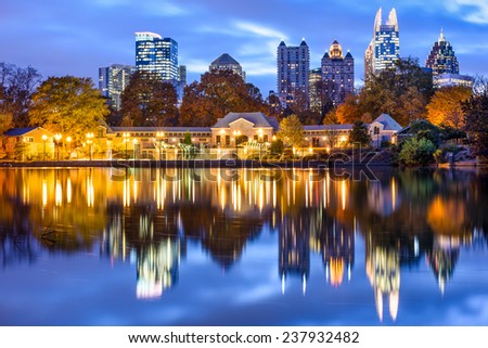 Atlanta, Georgia, USA downtown city skyline at Piedmont Park's Lake Meer.
