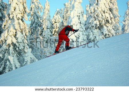 skier rises uphill