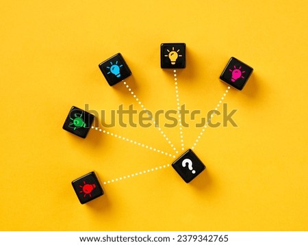 Choosing or deciding the best or the most suitable idea. Choose the right idea. Idea selection or generation. Brainstorming and creativity. Royalty-Free Stock Photo #2379342765