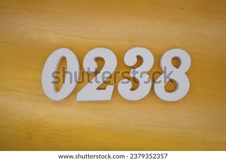The golden yellow painted wood panel for the background, number 0238, is made from white painted wood.