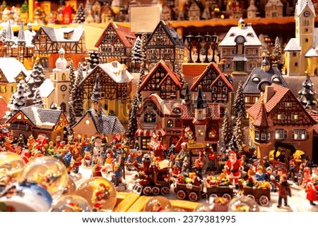 Lots of Christmas toys and gifts on the market counter at Christmas in Salzburg. Royalty-Free Stock Photo #2379381995