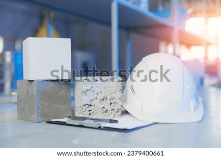 Check size and controls quality of concrete cube in laboratory. Concept industry lab for testing building materials. Royalty-Free Stock Photo #2379400661