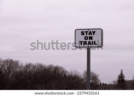 Toronto, ON, Canada – August 23, 2023:  View at the Stay on tray sign in park