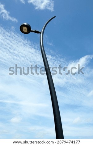The abstract view of a curved streetlight in Birstonas resort town (Lithuania).