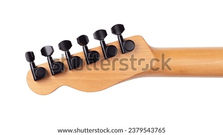 Electric guitar headstock backside isolated on white background. Six black pegs on a wooden headstock. Royalty-Free Stock Photo #2379543765