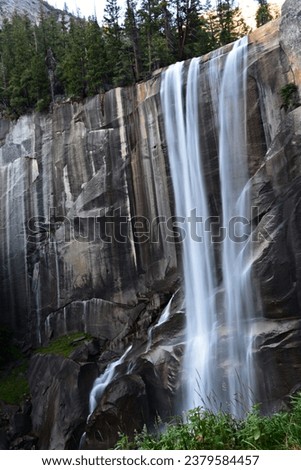 Beautiful waterfalls flowing along hiking trail