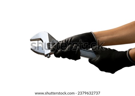 Mechanic holding a large adjustable wrench Size 375mm, white background