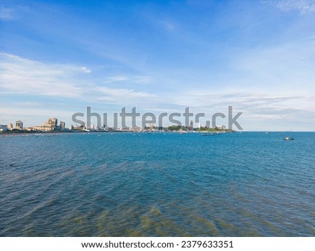 Aerial view sea beach Pattaya city morning sun light with building nature landscape