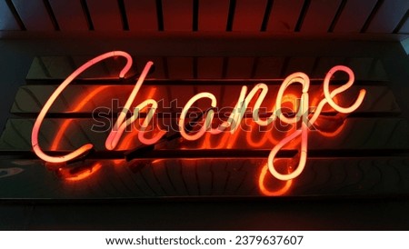 Charge written in bright orange