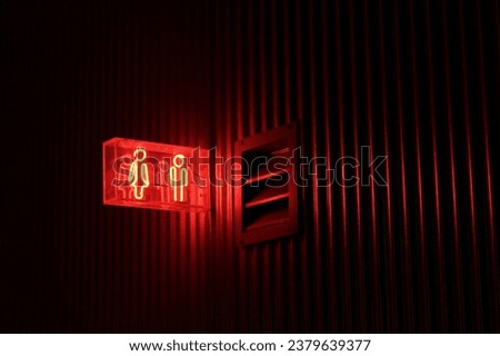 Neon bathroom Sign illuminated red