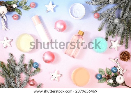 Winter skin care concept, banner, Christmas and New Year spa composition with fir branches, decorations and cosmetics, spa salon advertising invitation, selective focus