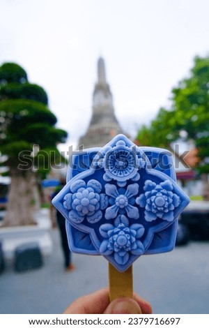 The blue ice cream with beautiful design at the Buddha.
