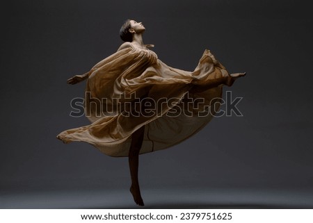 Beautiful young modern dancer or fitness dancer on a white isolated background	
 Royalty-Free Stock Photo #2379751625