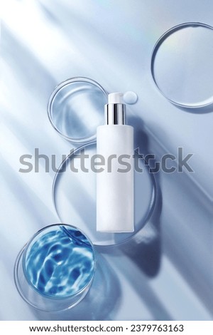 White skin care bottle essence cream container Scientific skin care product Royalty-Free Stock Photo #2379763163