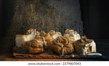A Tasty cinnamon rolls arrangement Royalty-Free Stock Photo #2379807043