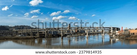 4K Image: Portland, Oregon with Rail Bridge Over the Willamette River, Scenic Urban Landscape