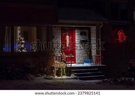 Toronto, Ontario, Canada - December 23, 2022: View the house decorated with lights for Christmas