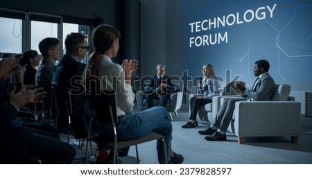 International Technology Conference: Host Asking Caucasian Female Tech CEO a Question In Front Of Audience. Successful Woman Delivering Inspirational Speech And Diverse Attendees Applaudding Her. Royalty-Free Stock Photo #2379828597