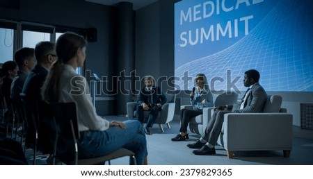 International Medical Summit: Host Asking Caucasian Female Pharmaceutical CEO a Question In Front Of Audience Of Diverse Attendees. Woman Talking About New Developments In Biotechnology, Medicine. Royalty-Free Stock Photo #2379829365