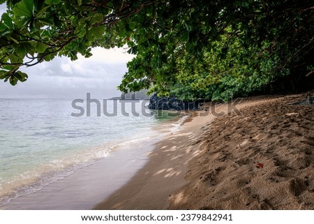 Hideaway Beach on the Northern Shore of Kauai, Hawaii. A hidden secluded secret Kauai beach, great for snorkelling Royalty-Free Stock Photo #2379842941