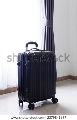 Black travel bag,Luggage or suitcases in modern hotel during check-in It's time to travel, service, travel, summer vacation and vacation concept. 