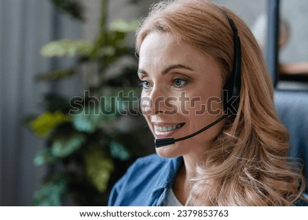 Closeup Caucasian mature business woman customer service agent, support team worker talking with customers in call center, assisting clients on phone. Online webinar