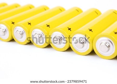 Yellow batteries isolated on white Royalty-Free Stock Photo #2379859471