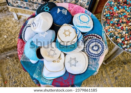 Jewish headgear at a stall in Jerusalem                                Royalty-Free Stock Photo #2379861185