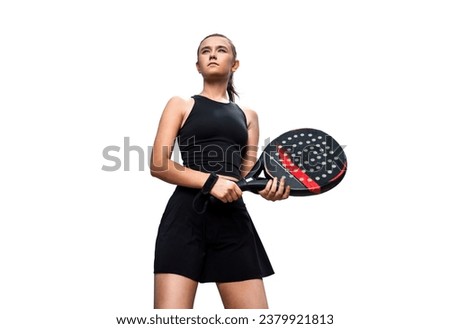 Junior padel tennis player with racket. Girl athlete with paddle racket isolated on white background. Sport concept. Download a high quality photo for the design of a sports app or web site.