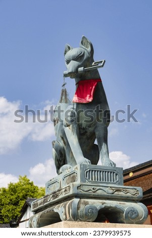 picture of a fox statue at Fushimi Inari Shrine, Kyoto District, Japan