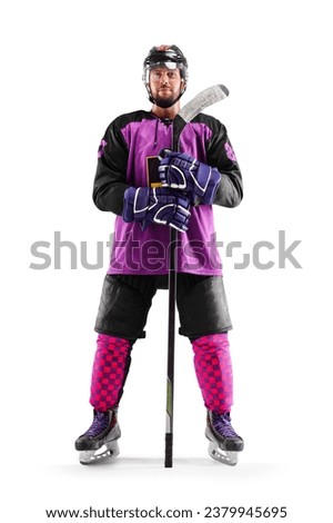 Professional hockey player. Hockey player holds a stick. Sports emotions. Isolated on white. Hockey player in helmet and gloves on white background Royalty-Free Stock Photo #2379945695