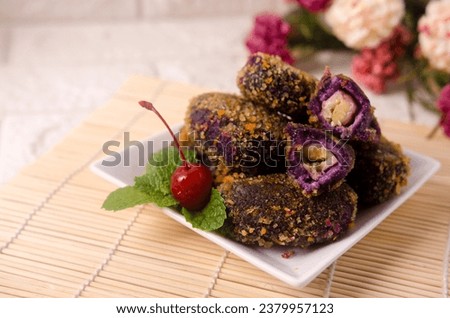 Banana-stuffed fried purple sweet potatoes can be a healthy snack option for children.  Purple sweet potatoes are rich in antioxidants, which are very beneficial for our bodies.