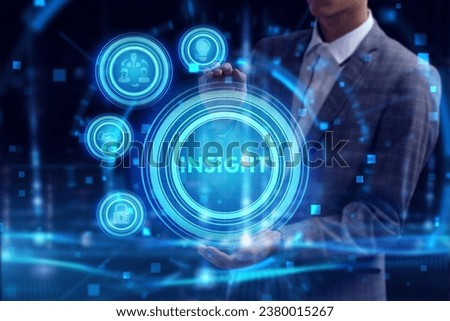 Business, Technology, Internet and network concept. Young businessman working on a virtual screen of the future and sees the inscription: Insight