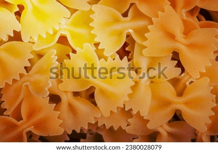 top view of farfalle pasta as background Royalty-Free Stock Photo #2380028079