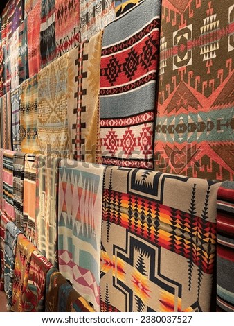 Hanging Native American woven rugs
