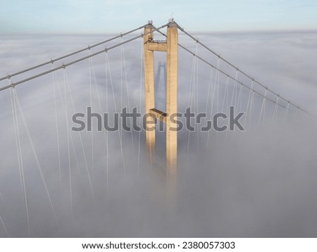 aerial view of the Humber Bridge in early morning mist 