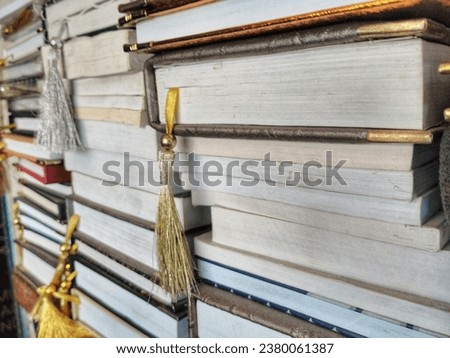Abstract Geometric background of Many Books Piles. Stack of books background. many books piles.